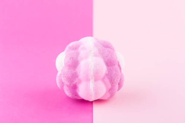 istock Aroma bath bomb on pink background 1171136298