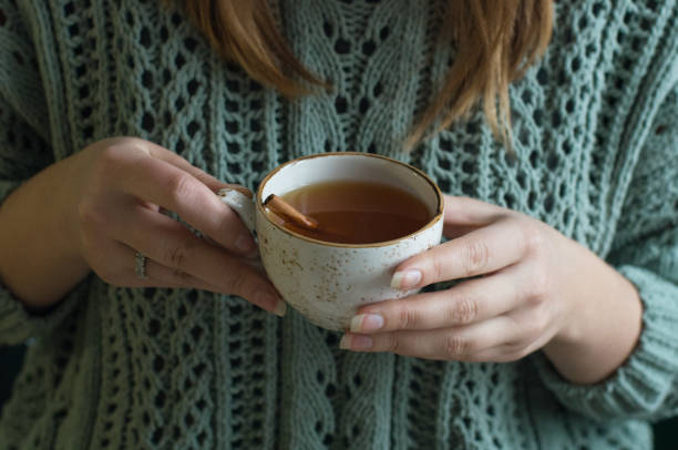 istock girl, cake and tea 1171139573