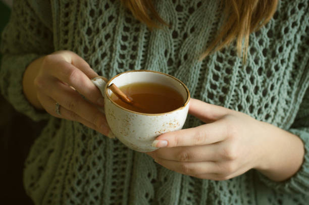 istock girl, cake and tea 1171139583