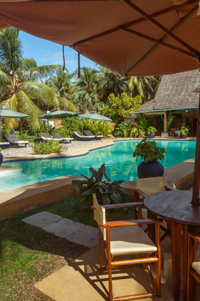 istock Swimming pool of a tropical hotel 1171143654