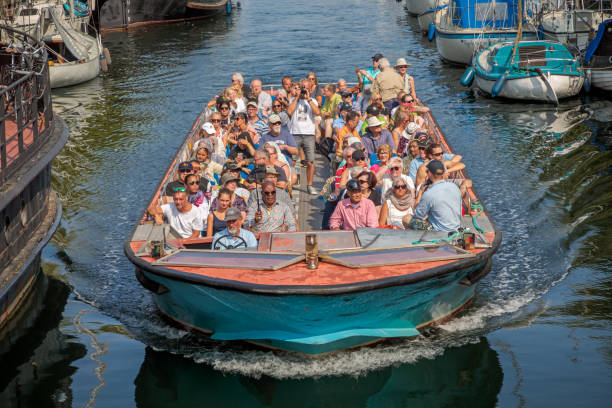 Christianshavn, Copenhagen, Denmark - August 27, 2019: Christianshavn is a old part of Copenhagen which reminds of Amsterdam, with old houses and a lot of boats, most are for pleasure.