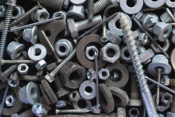 istock Bolts and nuts of various diameters close-up. 1171149759
