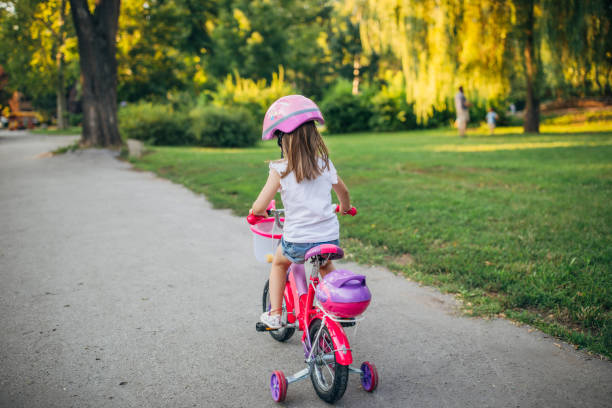 istock Girl learning to drive a bike 1171159828