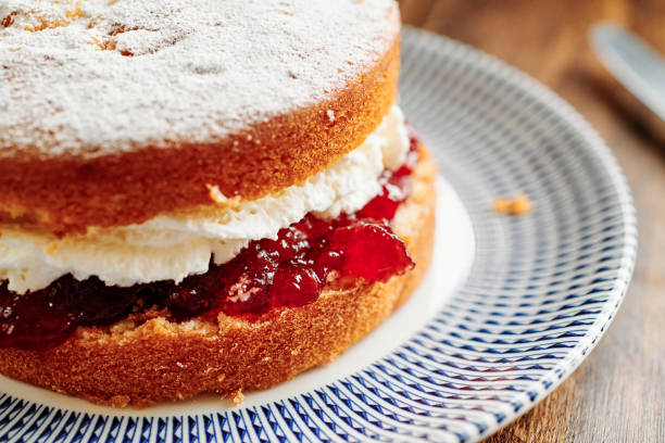 istock Whole Victoria sponge cake on a vintage palate. 1171160712