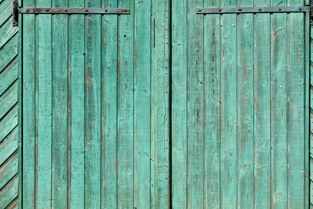 Green turquoise old wooden gate