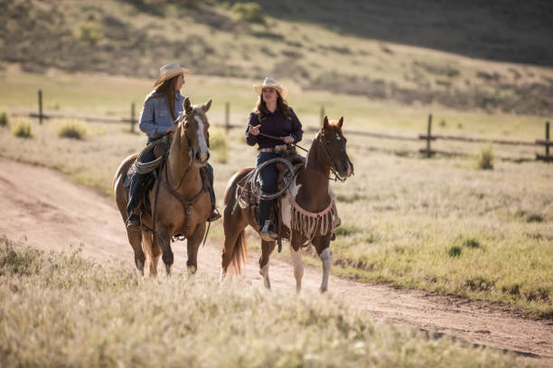 istock Cowgirls Horseback Riding 1171163003