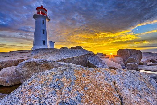 Peggy's Cove lighthouse at early dawn in the province of Nova Scotia, Canada