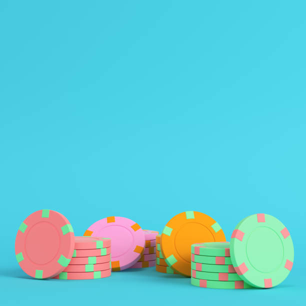 istock Colorful casino chips on bright blue background in pastel colors 1171165575