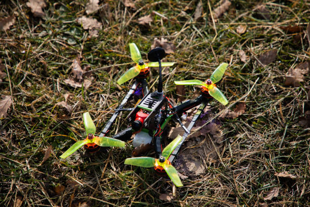 istock Above view of a static drone in the grass before flying 1171167019