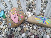 istock Painted stones in children art 1171170102