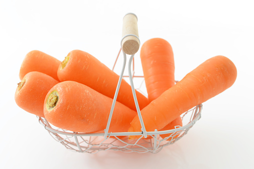 Fresh carrots in basket