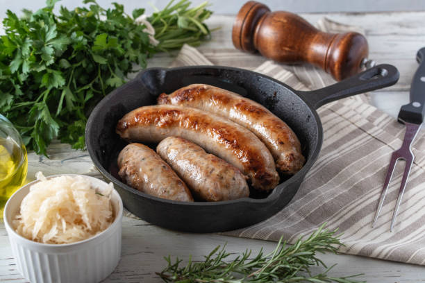 istock grilled italian german sausage on cast iron pan 1171173718