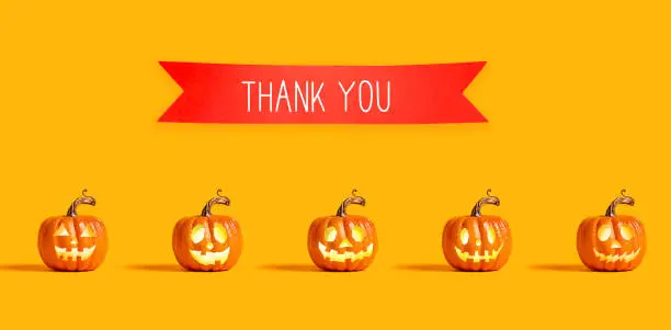 Photo of Thank you message with orange pumpkins