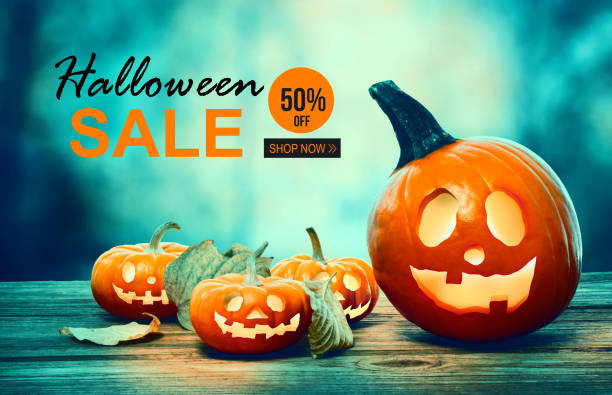 istock Halloween sale with pumpkins at night 1171175007