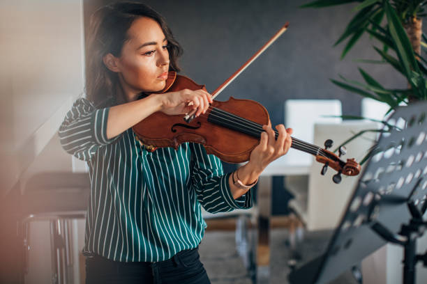 istock Violinist Woman 1171175133