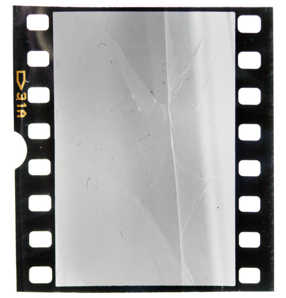 istock old buckled 35mm filmstrip with empty frame 1171177428