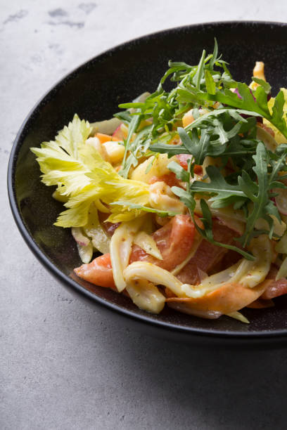 istock Fresh green squid salad with arugula 1171179626