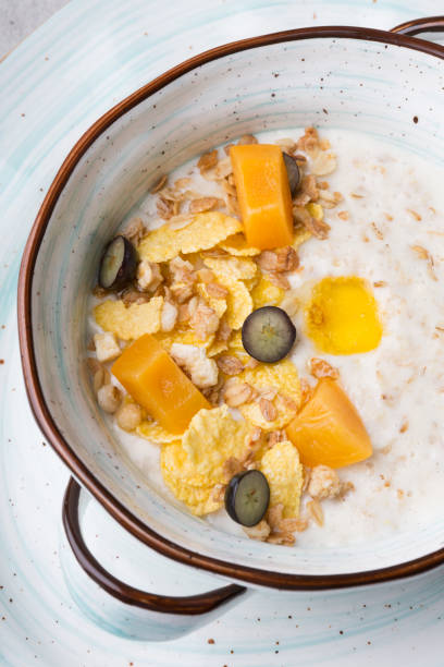istock Fresh cooked oatmeal porridge served with grapes 1171179820
