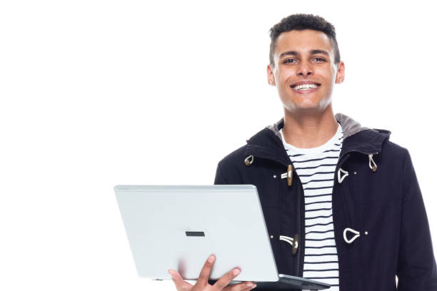 istock Handsome tall black man wearing a jacket on white background - holding laptop 1171181055