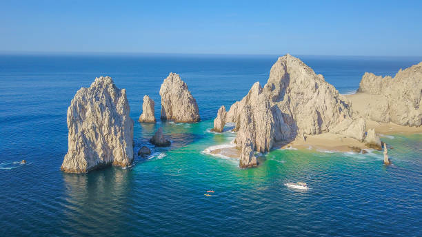 Aerial view of the arch in Cabo San Lucas, Mexico Aerial drone picture in Cabo San Lucas natural arch stock pictures, royalty-free photos & images