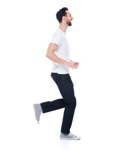 istock Handsome man in white shirt and jeans 1171182491