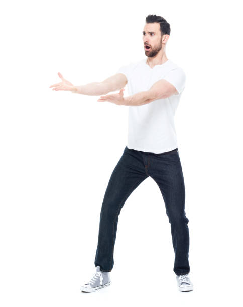 istock Handsome man in white shirt and jeans 1171182593