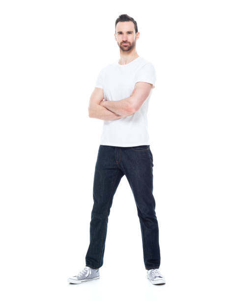 istock Handsome man in white shirt and jeans 1171182714