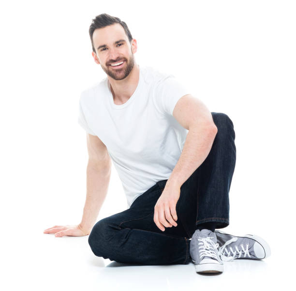 istock Handsome man in white shirt and jeans 1171182740