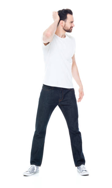 istock Handsome man in white shirt and jeans 1171183275