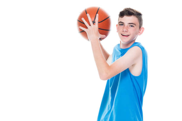 istock 13 year old male basketball player 1171183456
