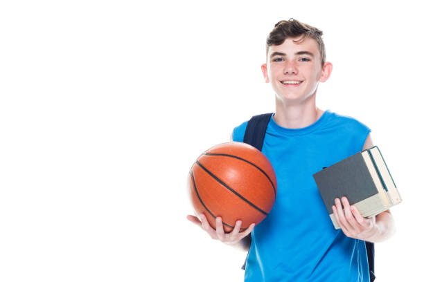 istock 13 year old male basketball player who is also a student 1171183461