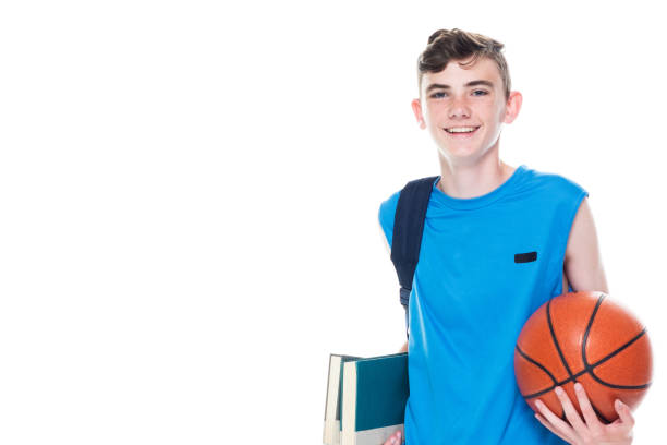 istock 13 year old male basketball player who is also a student 1171183482