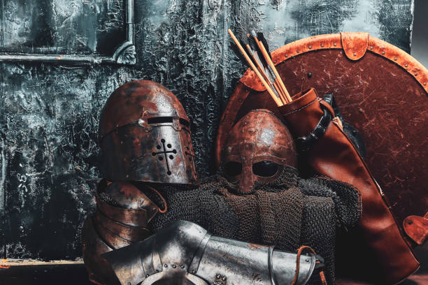 istock Still life with ancient shield, two rusted helmets, quiver of arrows 1171184009