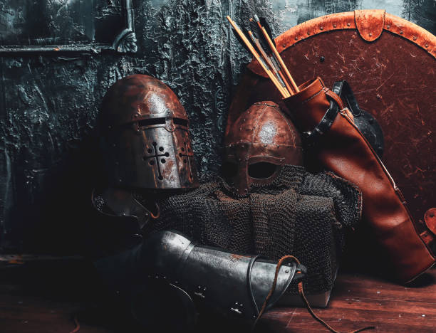 istock Still life with ancient shield, two rusted helmets, quiver of arrows 1171184053