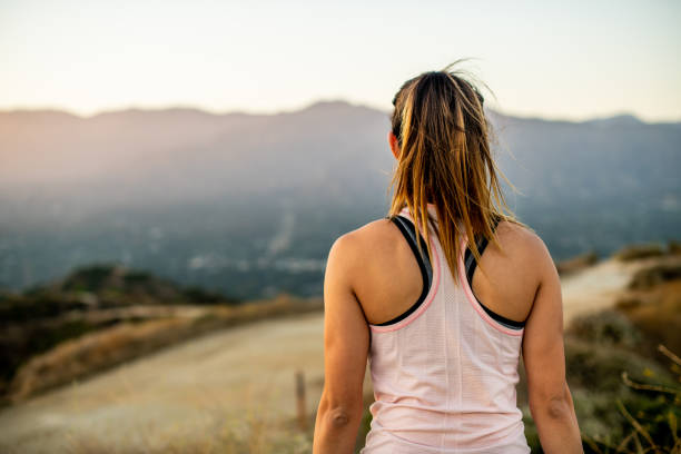 istock Young Hispanic Woman Exercising In The Mountains 1171184608