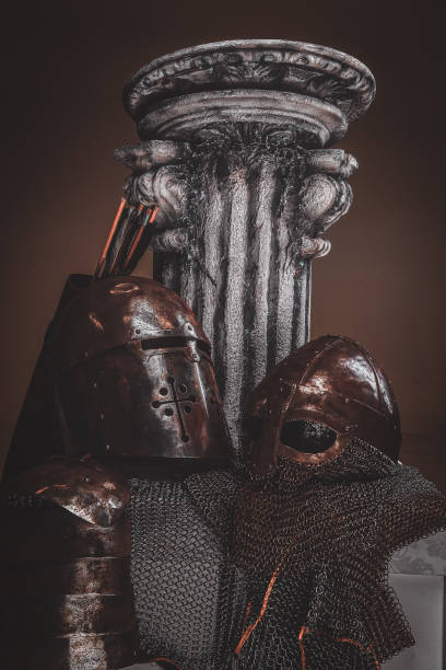 istock Still life at studio withs belt, ancient pedestal and helmets. 1171184876