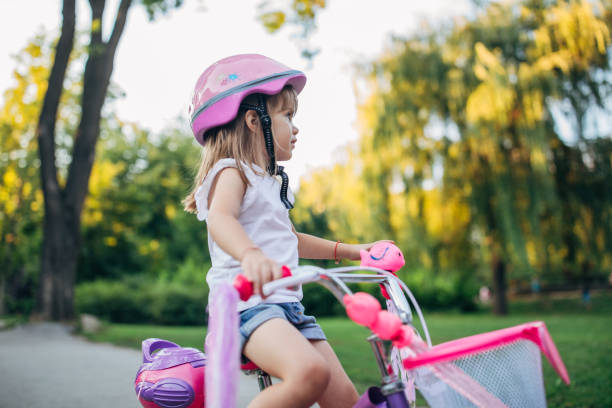 istock Girl learning to drive a bike 1171187397