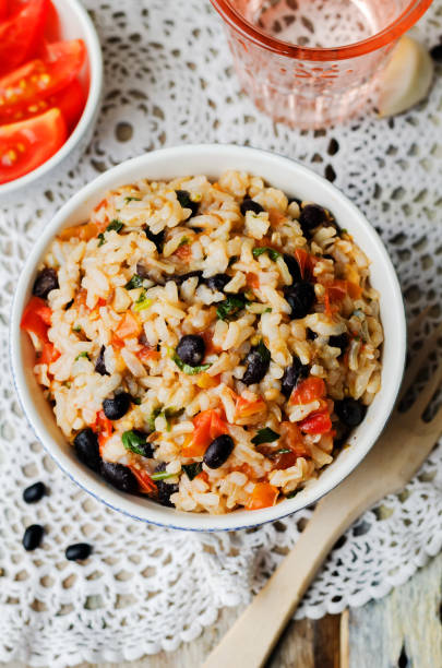 istock Mexican tomato black beans rice with cilantro 1171188088