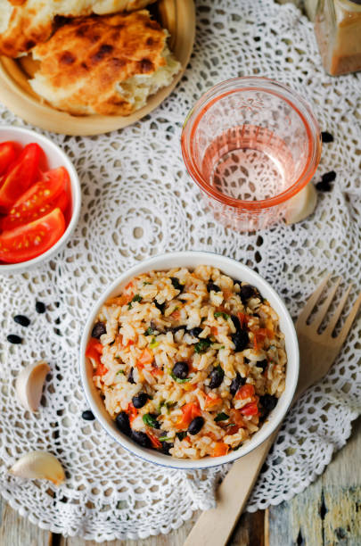 istock Mexican tomato black beans rice with cilantro 1171188095