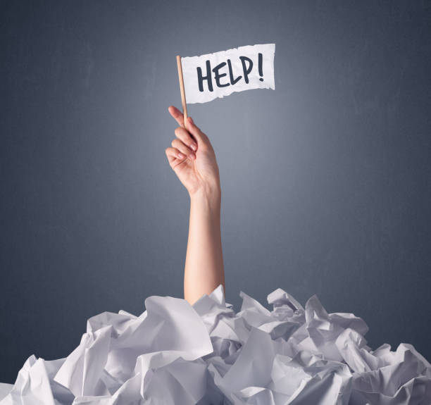 istock Female hand holding help sign 1171188957