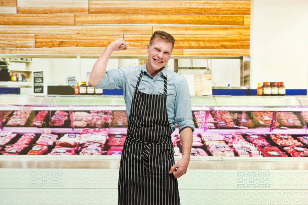 istock Butcher at work - fist pump 1171190089