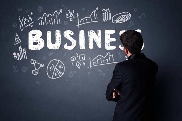 istock Businessman with business plan 1171191936