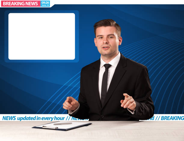 istock Television reporter telling breaking news at his studio desk with copy space 1171194026