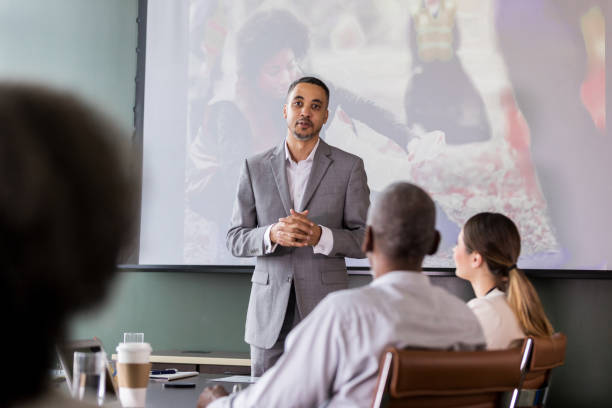 istock Businessman discusses charity events for executives 1171196526