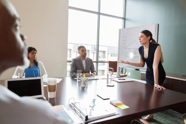 istock Businesswoman gives presentation 1171196565
