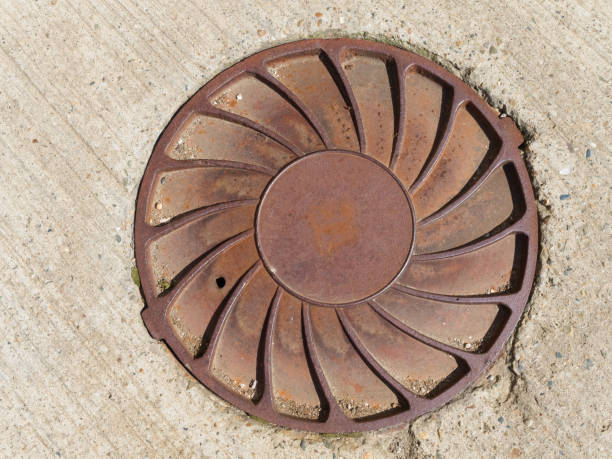 istock Sewer iron hatches in concrete at Rosa Khutor 1171202397