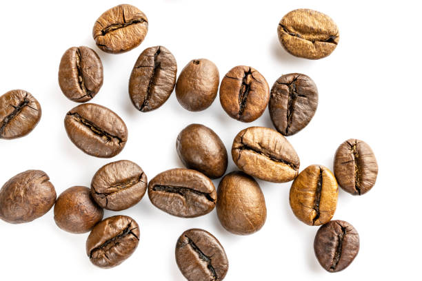 istock Roasted coffee beans isolated in white background cutout. Coffee background or texture concept. 1171203992