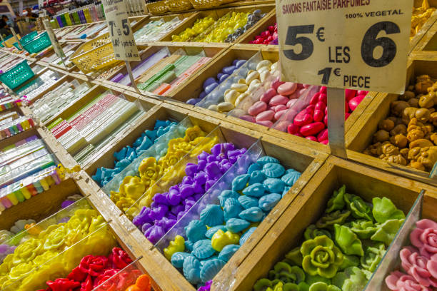 The French region of Provence on April 05, 2014: Produce markets in the town of Apt selling artisanal scented soap bars in Provence, France