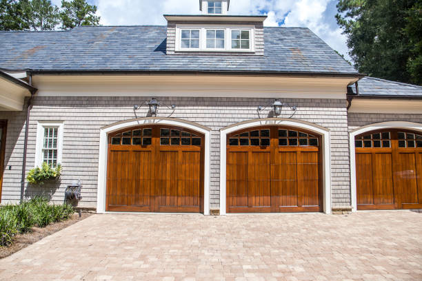 istock Stained wood custom garage doors for large southern home 1171207364