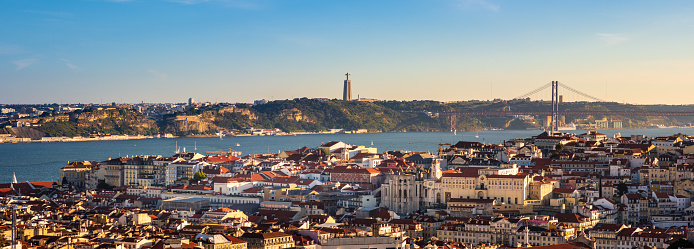 Perched upon a hillside in the Graca neighborhood, Miradouro da Senhora do Monte provides tourists and locals spectacular views of the Tagus River, Castle of Saint George and the 25 de Abril Bridge.